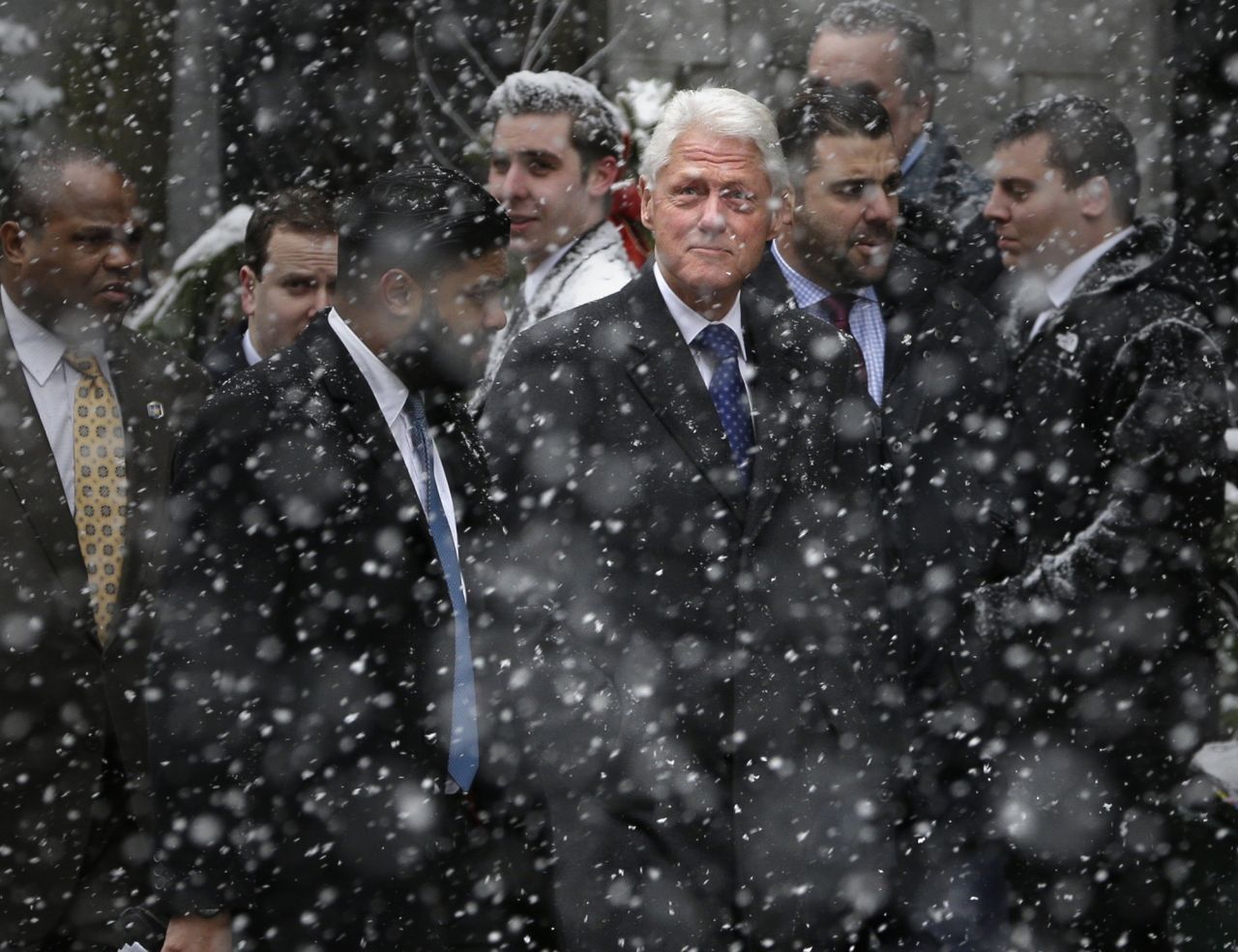 Former President Bill Clinton arrives for the funeral.