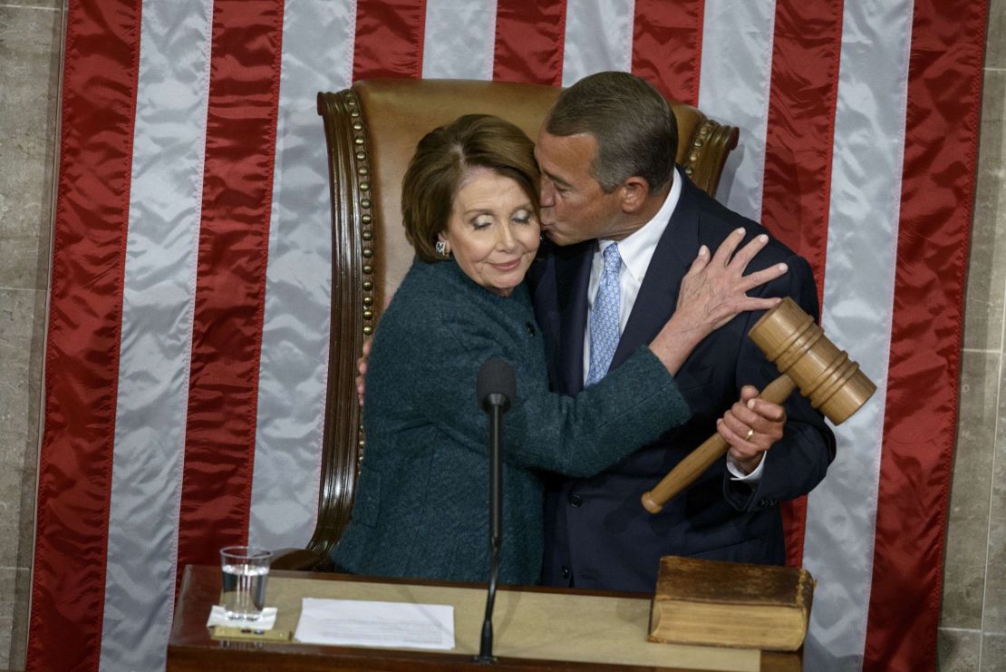 House Minority Leader Nancy Pelosi, D-CA, is kissed as she hands over the gavel to Speaker of the House John Boehner during a swearing-in ceremony in the House of Representatives as the 114th Congress convenes on Capitol Hill January 6.