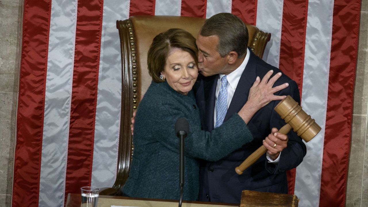 House Minority Leader Nancy Pelosi, D-CA, is kissed as she hands over the gavel to Speaker of the House John Boehner during a swearing-in ceremony in the House of Representatives as the 114th Congress convenes on Capitol Hill January 6.