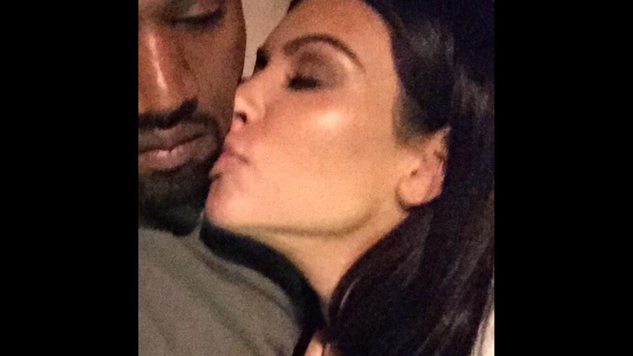 Television personality Kim Kardashian kisses her husband, rapper Kanye West, in this selfie <a href="https://twitter.com/KimKardashian/status/551264115411279872/photo/1" target="_blank" target="_blank">she tweeted</a> Friday, January 2. "Good night," she wrote.