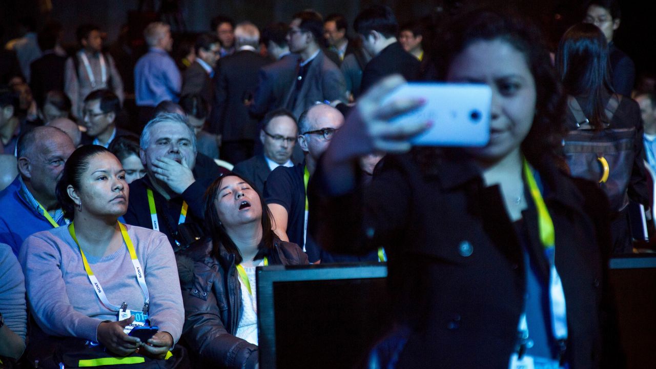 A woman takes a selfie as she and others wait for a Samsung news conference to begin Monday, January 5, at the Consumer Electronics Show in Las Vegas.