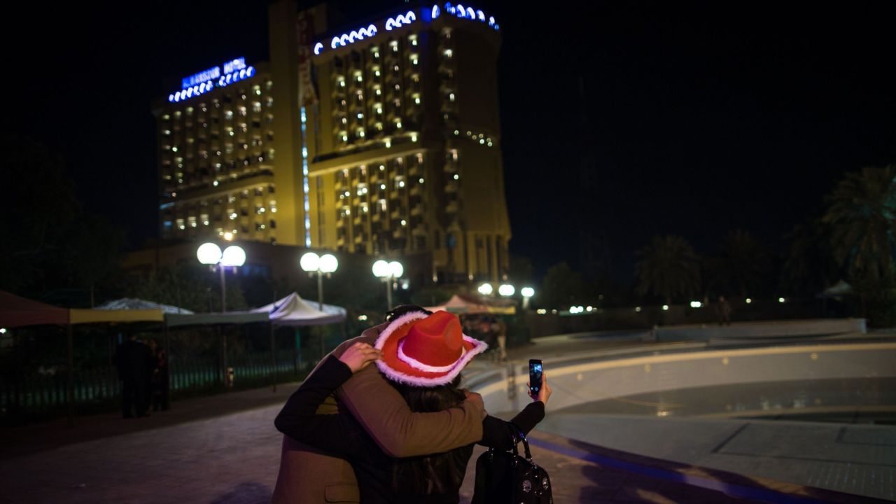 A couple in Baghdad, Iraq, takes a selfie to celebrate the new year on Thursday, January 1. <a href="http://www.cnn.com/2014/12/31/living/gallery/look-at-me-selfies-1231/index.html" target="_blank">See 23 selfies from last week</a>