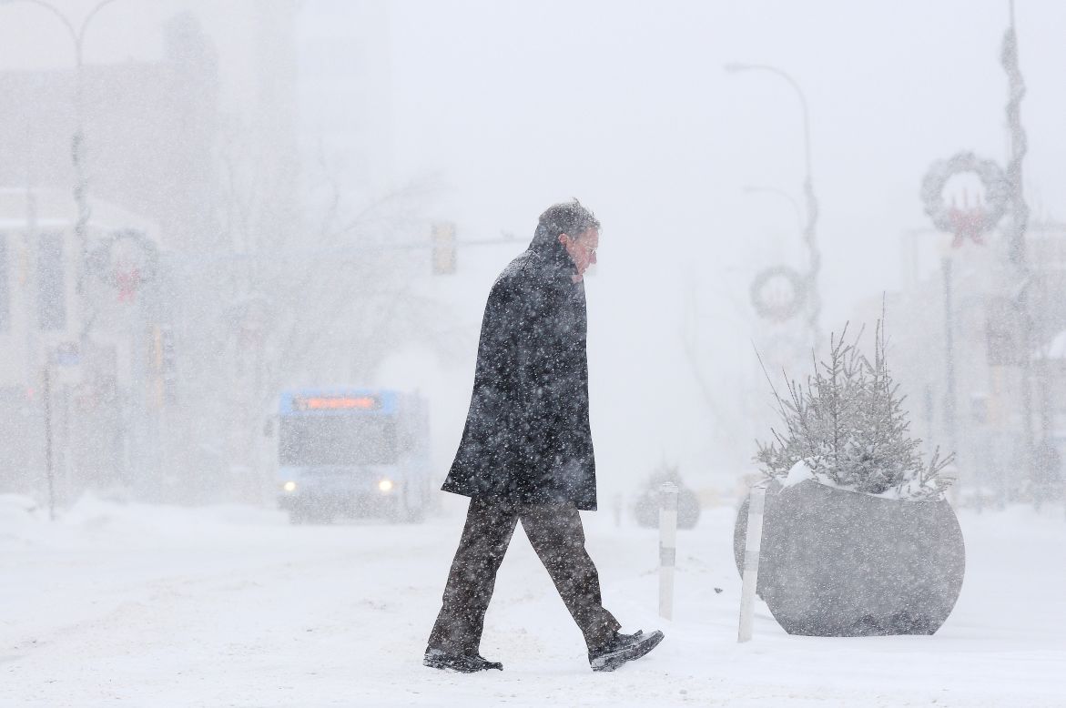 Bill Taylor walks to work during a winter storm on January 5, in Sioux Falls, South Dakota.