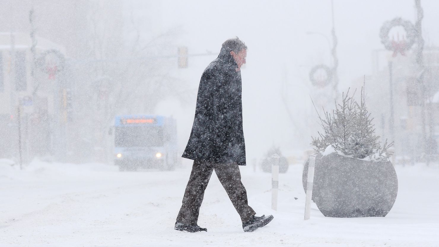 Bill Taylor walks from the YMCA to his office on Monday in Sioux Falls, South Dakota. 