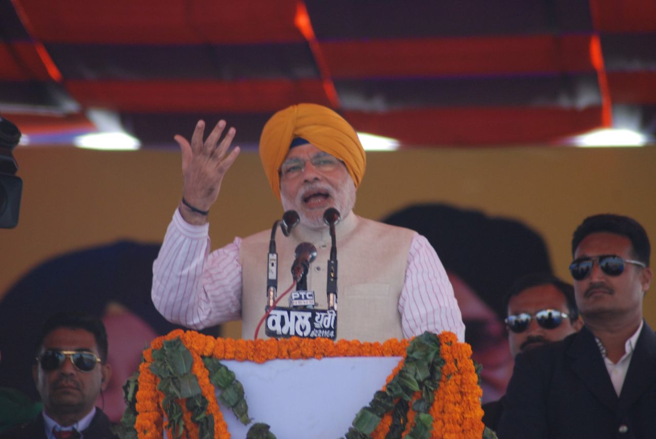Modi speaks at a rally in Punjab wearing a saffron turban, also known as Dastar. A piece of long cloth is tied and wound around the head several times and is worn by Sikhs across the world.