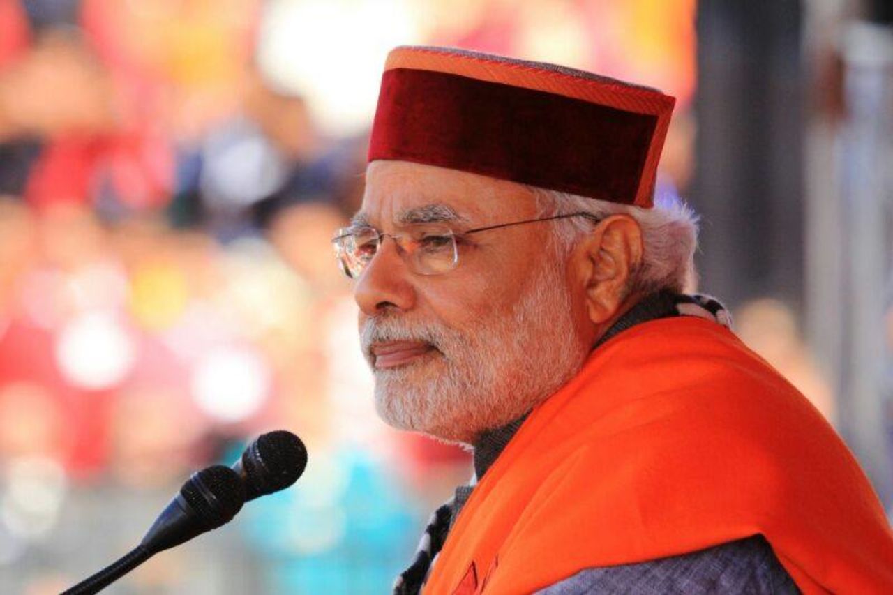 Modi wears a traditional Maroon Pahari topi -- a mountain cap that is often given to guests visiting the state of Himachal Pradesh in India. These hats have become famous art work of local tribes. They come in two colors -- green and maroon -- with different designs representing different areas in the state.
