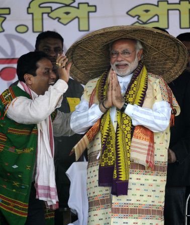 Modi attends a rally in the state of Assam wearing the traditional Japi hat made from bamboo. The Japi is usually worn by Assamese farmers and cowherds and is also a ceremonial item.