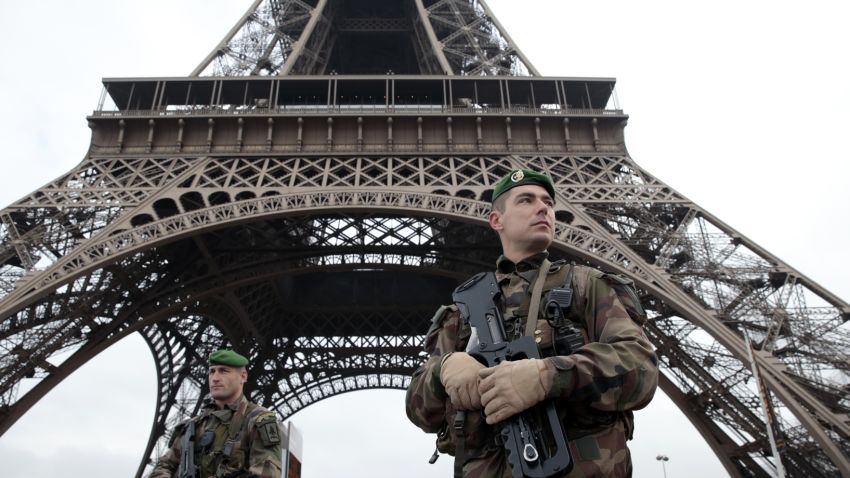 French soldiers patrol around the Eiffel Tower on January 7.