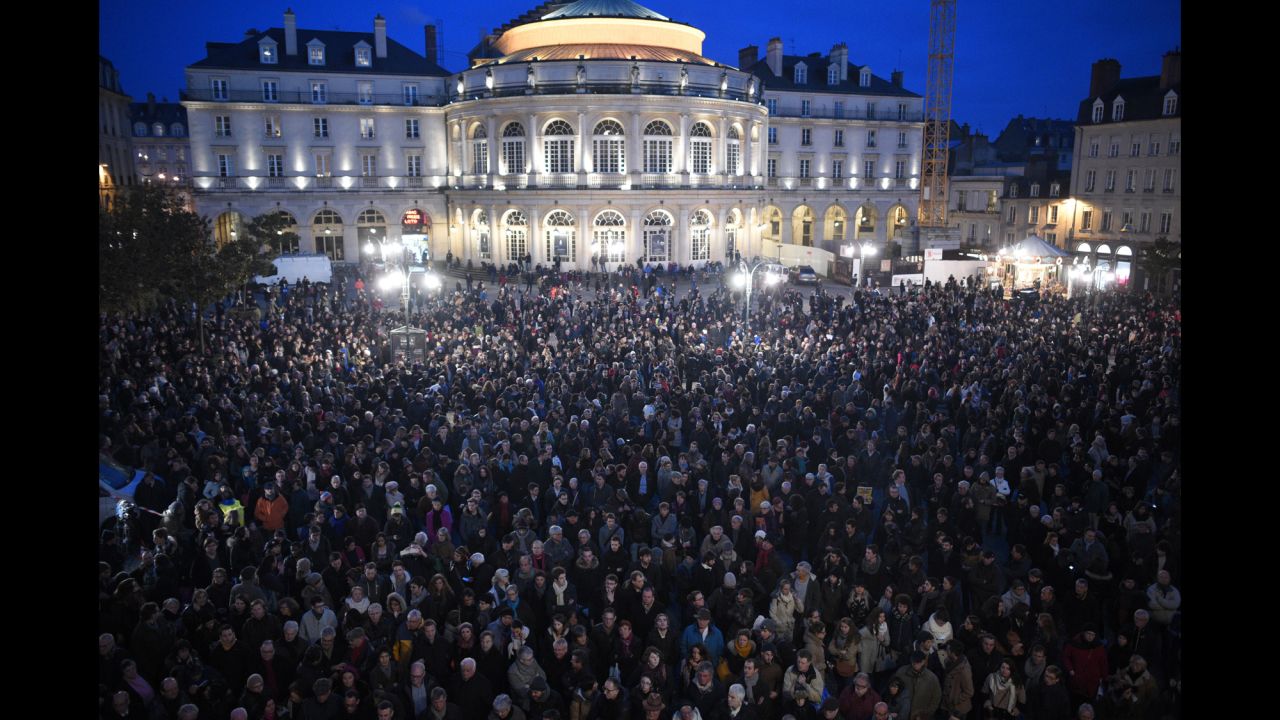 People gather in front of city hall in Rennes on January 7.