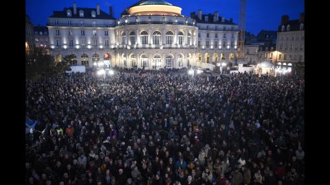 People gather in front of city hall in Rennes on January 7.
