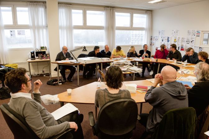 Charlie Hebdo staff attend an editorial meeting in 2012. 