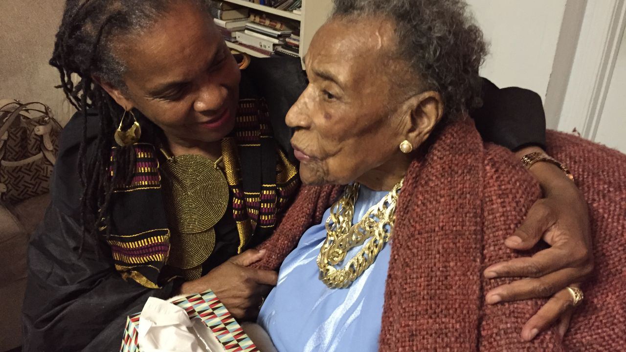 Amelia Boynton Robinson, 103, chats with activist Faya Rose Toure before a special screening of "Selma" at Boynton Robinson's home in Tuskegee, Alabama.