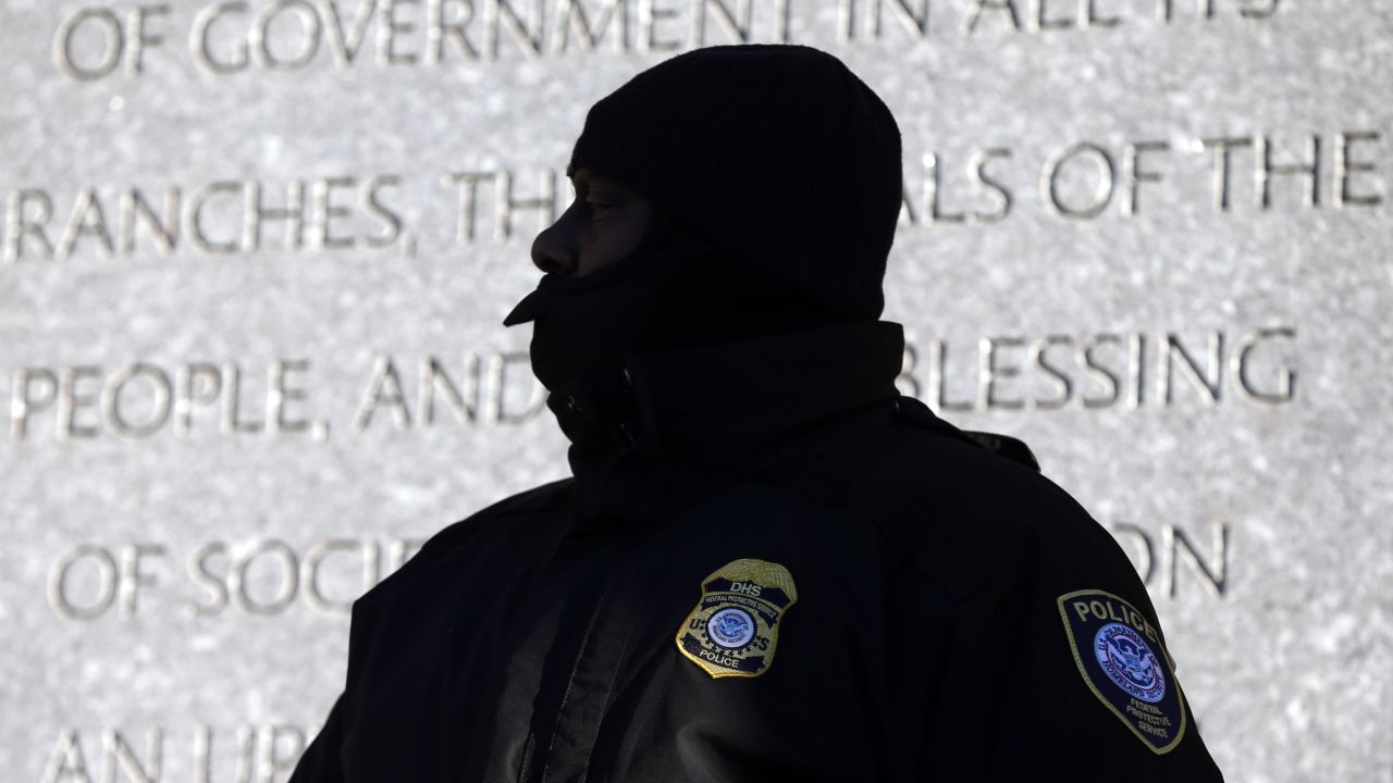 A police officer stands outside the federal courthouse in Boston on Monday, January 5. <a href="http://www.cnn.com/2015/01/05/justice/tsarnaev-trial-starts-things-to-know/index.html" target="_blank">It was the first day</a> in the trial of Boston Marathon bombing suspect Dzhokhar Tsarnaev.