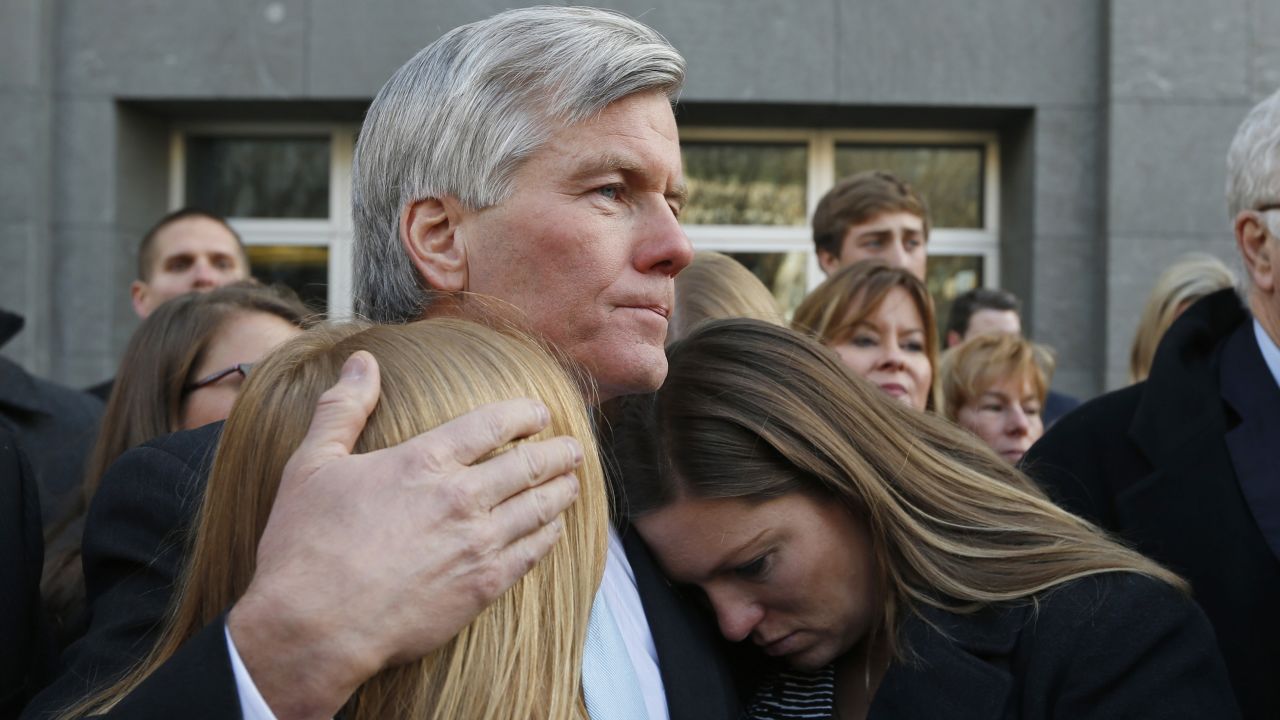 Former Virginia Gov. Bob McDonnell hugs his daughters Cailin Young, left, and Jeanine McDonnell Zubowsky after speaking outside federal court in Richmond, Virginia, on Tuesday, January 6. <a href="http://www.cnn.com/2015/01/06/politics/bob-mcdonnell-sentencing/index.html" target="_blank">McDonnell was sentenced to two years in prison</a> after being found guilty on corruption charges.