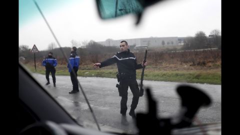 French authorities block access to a road leading to Dammartin-en-Goele on January 9.