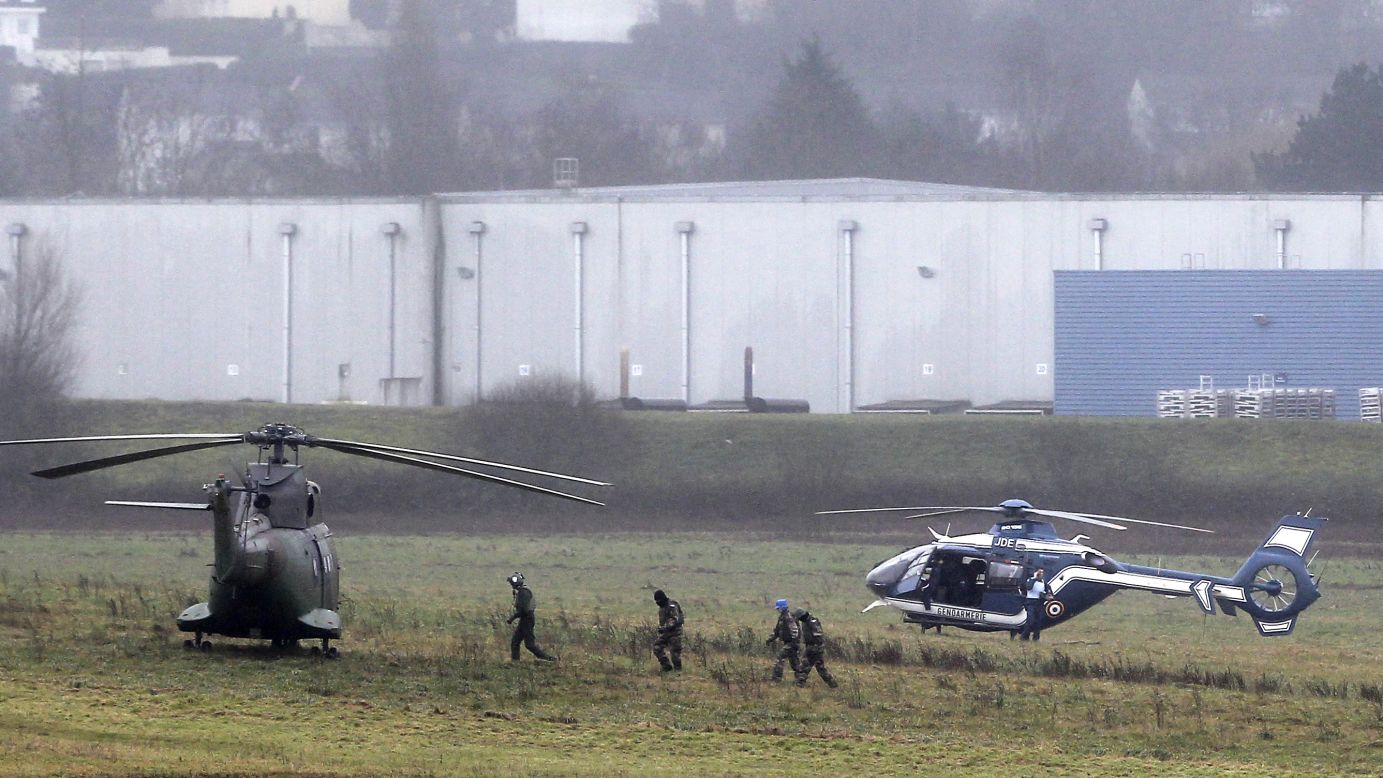 Police and military forces take positions in Dammartin-en-Goele.