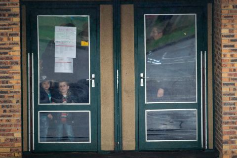 Children wait inside a school before being picked up by their parents. Dammartin-en-Goele residents were told to stay inside during the standoff, and schools were put on lockdown, the mayor's media office told CNN.