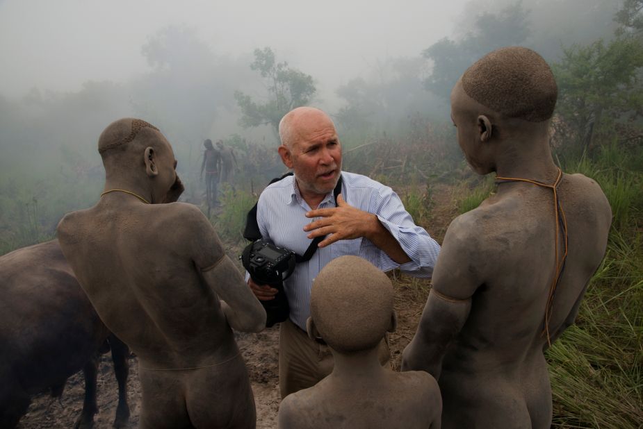 Steve McCurry with members of the Surma Tribe.