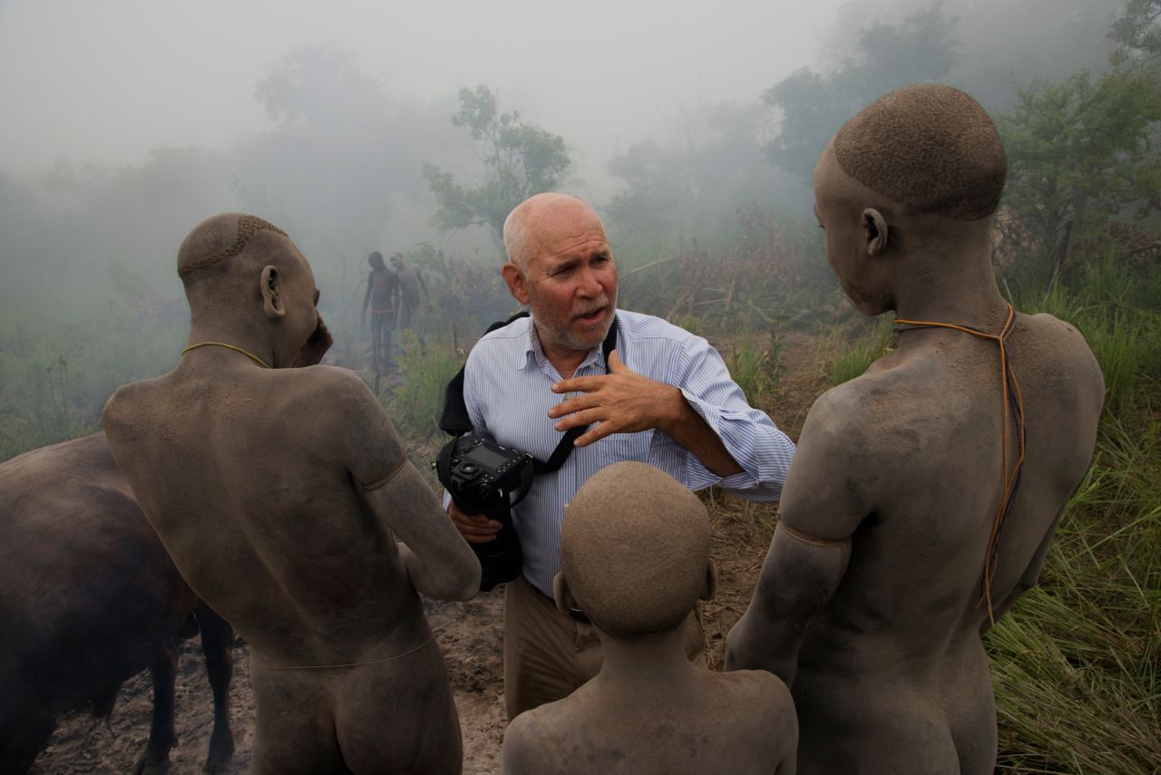 Steve McCurry with members of the Surma Tribe in Ethiopia