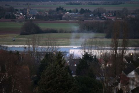 Smoke rises from the building in Dammartin-en-Goele, a town about 40 kilometers (25 miles) northeast of Paris.