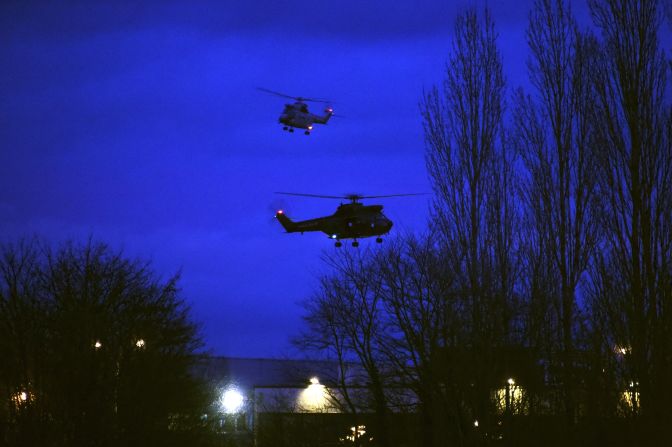 Helicopters fly over a printing shop in Dammartin-en-Goele, France, where there was a standoff Friday, January 9, between police and two men suspected in <a href="index.php?page=&url=http%3A%2F%2Fwww.cnn.com%2F2015%2F01%2F07%2Fworld%2Fgallery%2Fparis-charlie-hebdo-shooting%2Findex.html" target="_blank">the Charlie Hebdo shootings</a> earlier this week. Cherif and Said Kouachi, the two brothers wanted in the case, were killed by security forces, authorities said.