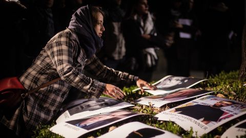 People gather in front of the French Embassy in Mexico City on Thursday, January 8.