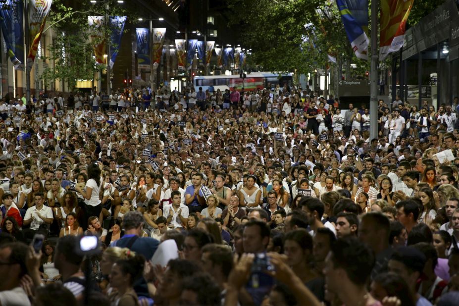 A crowd gathers in Sydney on January 8 to show their support for Charlie Hebdo.