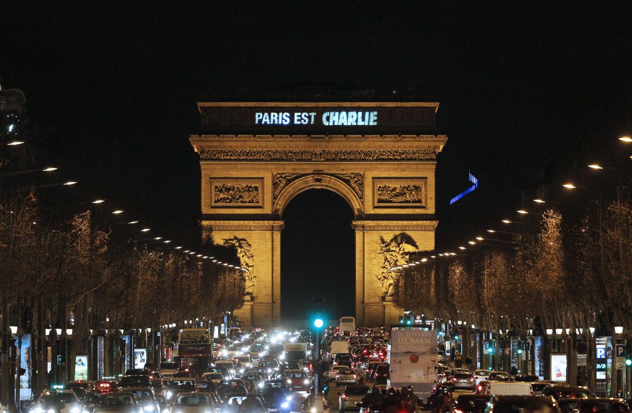 Lights on the Arc de Triomphe say "Paris est Charlie" (Paris is Charlie) on January 9.