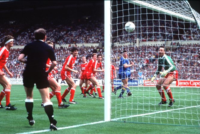 Unorthodox in the extreme, Wimbledon provided one of the great FA Cup final shocks when beating league champions Liverpool in 1988. Lawrie Sanchez (in blue) scored the only goal of the game. 