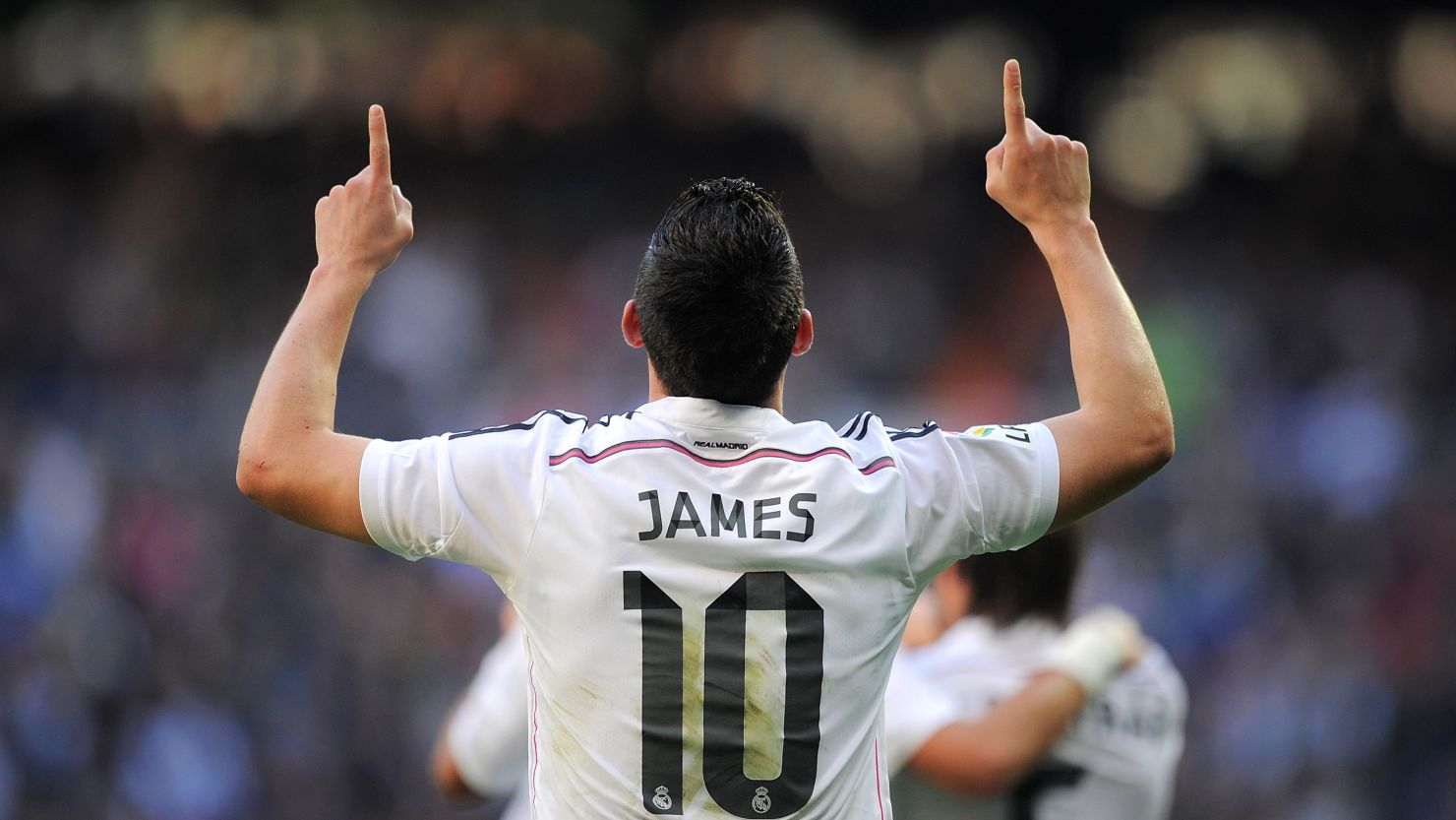 James Rodriguez celebrates after opening the scoring against Espanyol at the Santiago Bernabeu.