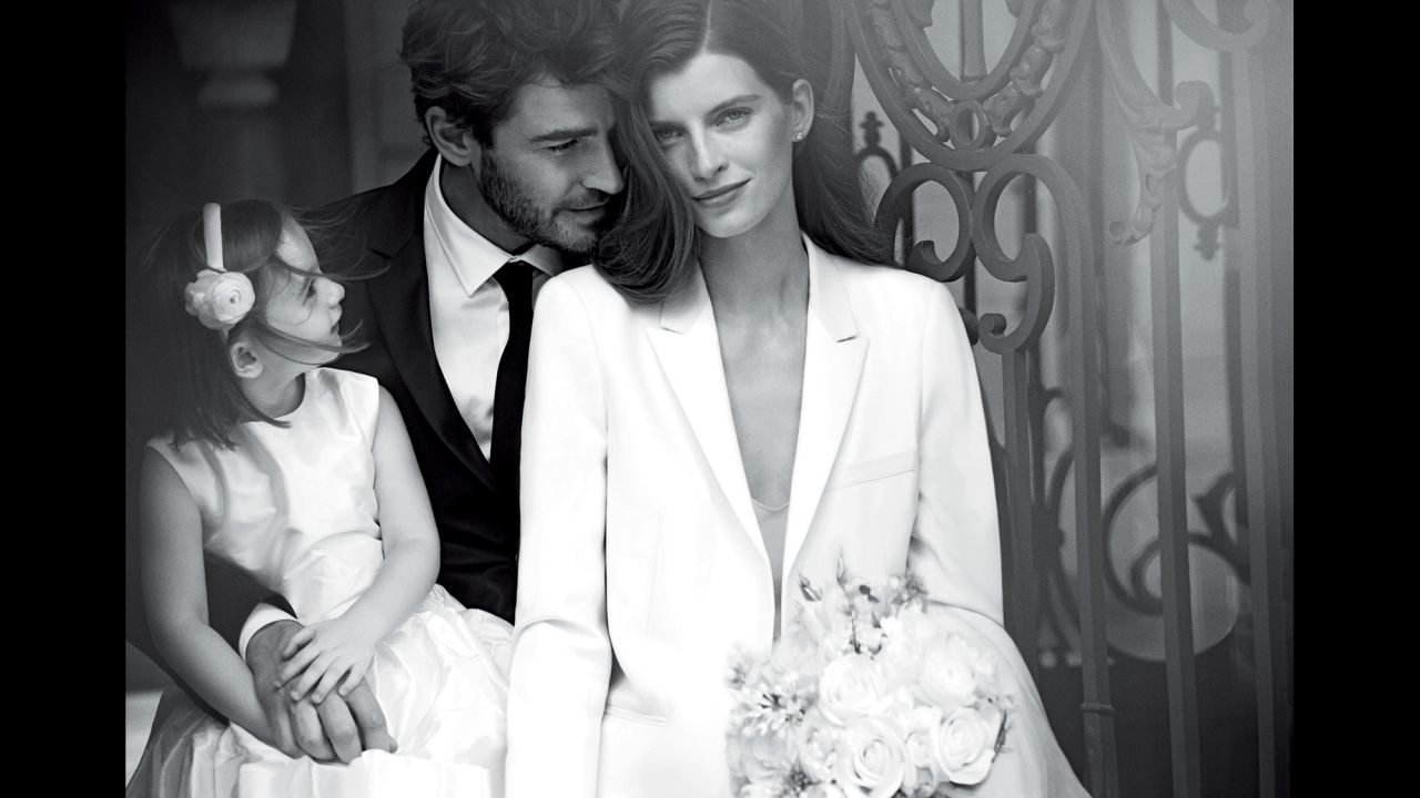 The campaign includes an image of a couple on their wedding day with their child, a nod to couples having children outside marriage.