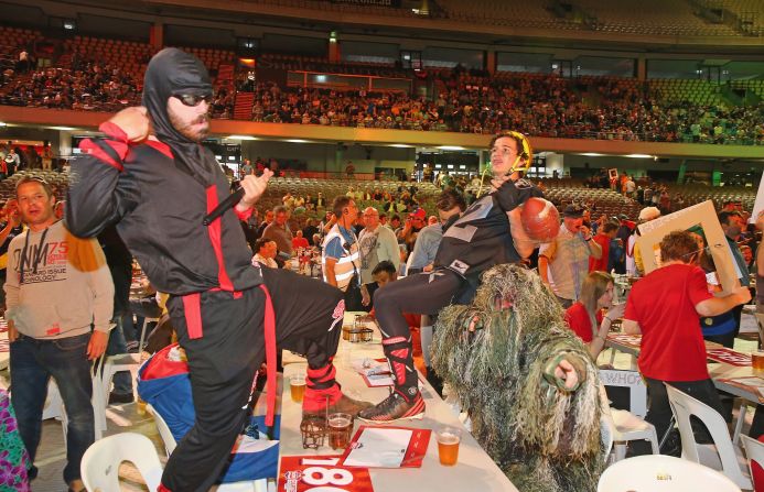 Revelers at the darts match were dressed in fancy dress and having a great time until the situation later turned ugly.