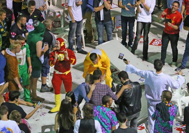 Fans in a variety of fancy dress costumes were in exuberant mood as the alcohol flowed freely at the Etihad Stadium in Melbourne.
