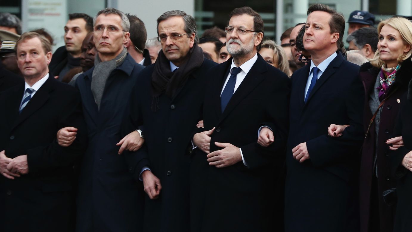 British Prime Minister David Cameron, second from right, stands with other world leaders during the rally.