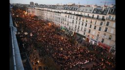 Thousands of people march down Boulevard Voltaire from Place de la Republique in route to Place de la Nation.