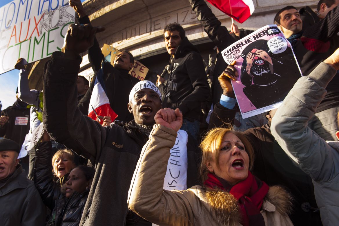 The rally began with a march through Paris streets at 3 p.m., but many stayed into the night.