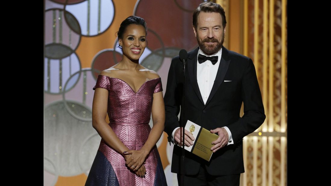 Actors Kerry Washington and Bryan Cranston take the stage to present an award.