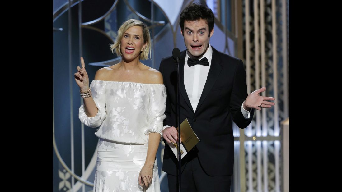 Kristen Wiig and Bill Hader present the award for best screenplay.