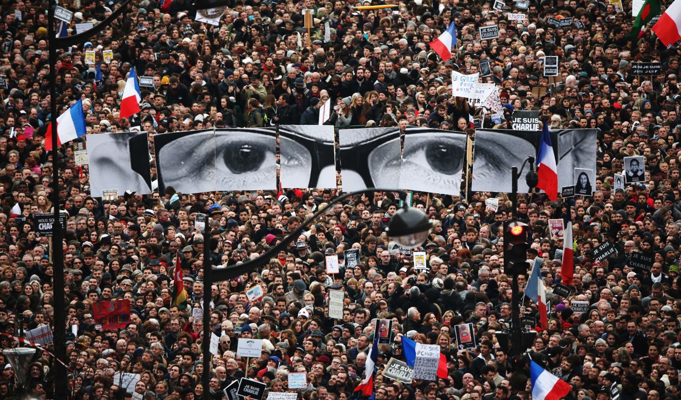 JANUARY 12 - PARIS, FRANCE: Demonstrators make their way along Boulevard Voltaire in a unity rally following the recent terrorist attacks.<a href="http://cnn.com/2015/01/11/world/charlie-hebdo-paris-march/index.html"> At least 3.7 million people</a> took part and <a href="http://cnn.com/2015/01/11/politics/obama-kerry-paris/index.html">French President Francois Hollande was joined by world leaders</a> such as British PM David Cameron, Israeli PM Benjamin Netanyahu, German Chancellor Angela Merkel, Palestinian Authority President Mahmoud Abbas and Russian Foreign Minister Sergey Lavrov. 