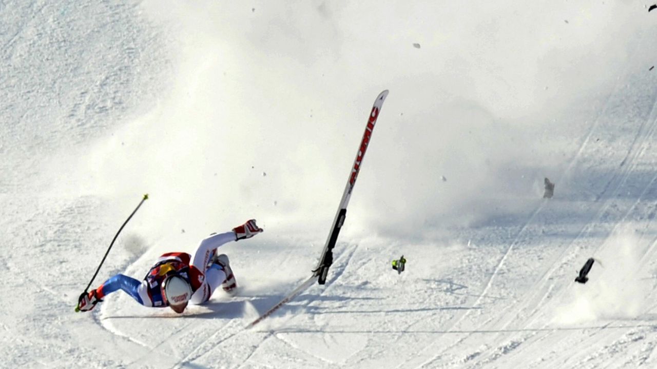 Switzerland's Daniel Albrecht crashes in front a finish area during the second official practice in men's downhill during FIS ski World cup in Kitzbuhel on January 22, 2009. AFP PHOTO / Samuel Kubani (Photo credit should read SAMUEL KUBANI/AFP/Getty Images)