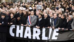 Samuel Sandler, father and grandfather of three of the victims of Islamist gunman Mohamed Merah, the Mayor of Lille and Socialist Party member Martine Aubry, Hassen Chalghoumi, Imam of the northern Paris suburb of Drancy and president of the French Association of Imams, French writer Marek Halter, UMP right-wing party member Eric Woerth and Joel Mergui, president of the Central Jewish Consistory of France and Pierre Gattaz (3rdR), head of the French employers' association (MEDEF) (5thR) take part in a Unity rally Marche Republicaine in Paris on January 11, 2015 in tribute to the 17 victims of a three-day killing spree by homegrown Islamists.