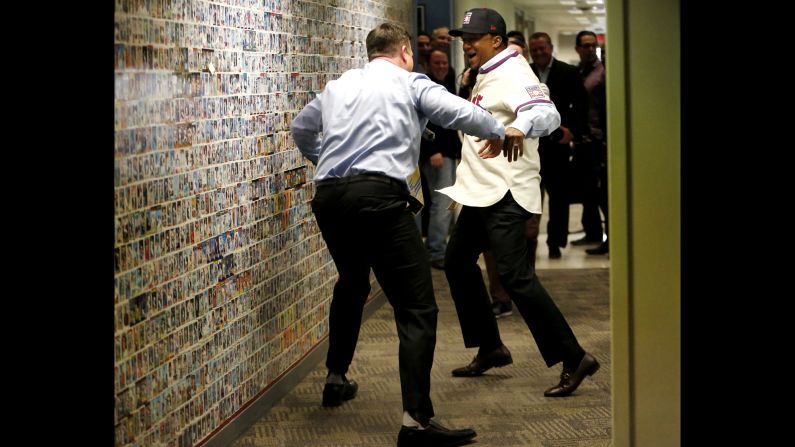 Former professional baseball player Pedro Martinez, right, is greeted by another ex-player, Sean Casey, as he arrives at a television show taping in Secaucus, New Jersey, on Wednesday, January 7. A day earlier, Martinez and three other players -- Craig Biggio, Randy Johnson and John Smoltz -- <a href="index.php?page=&url=http%3A%2F%2Fwww.cnn.com%2F2015%2F01%2F06%2Fus%2Fbaseball-hall-of-fame%2Findex.html" target="_blank">were elected</a> to the National Baseball Hall of Fame.
