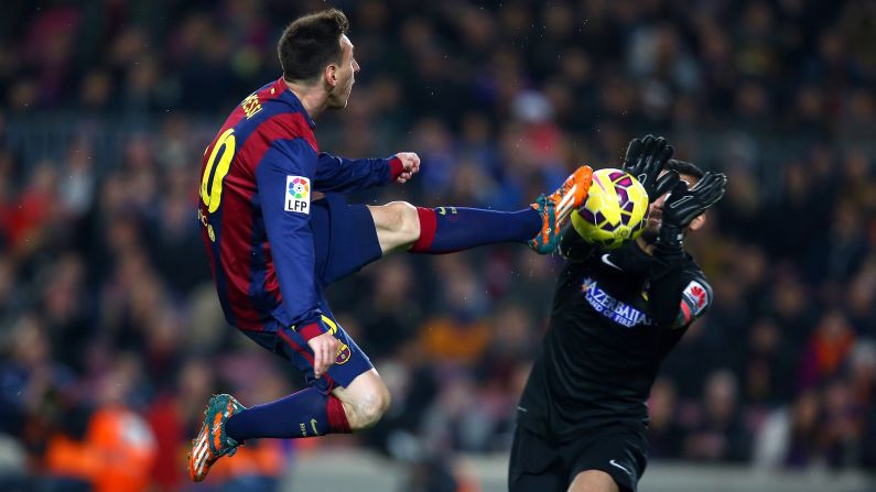 Barcelona forward Lionel Messi, left, and Atletico Madrid goalkeeper Miguel Angel Moya compete for the ball during a league match in Barcelona, Spain, on Sunday, January 11.