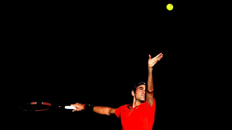Roger Federer serves to Grigor Dimitrov on Saturday, January 10, during the semifinals of the Brisbane International in Brisbane, Australia. Federer won in straight sets and then beat Milos Raonic in the final. The win over Raonic was the 1,000th victory of Federer's career.