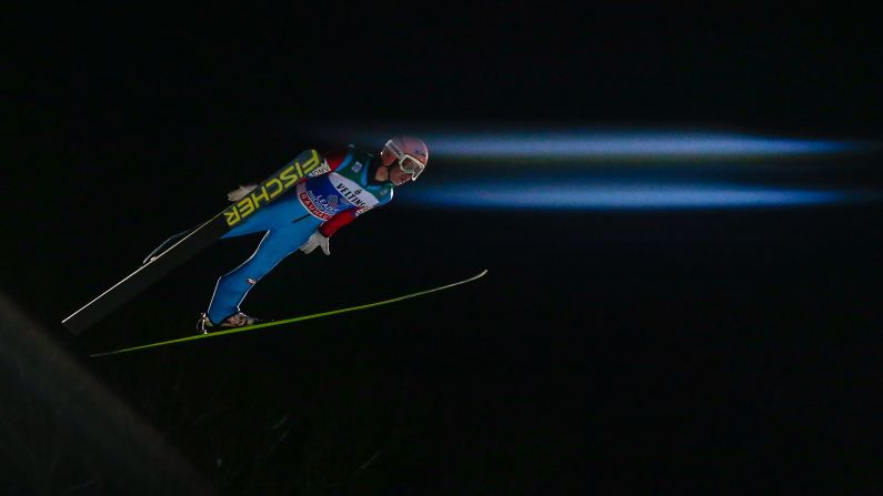 Austrian ski jumper Stefan Kraft soars through the air Tuesday, January 6, on his way to winning the Four Hills Tournament in Bischofhofen, Austria.