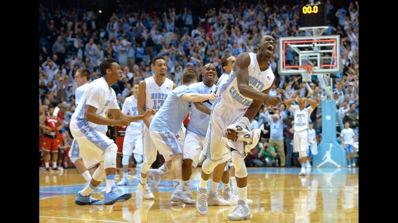 The North Carolina basketball team celebrates after defeating Louisville in a game played Saturday, January 10, in Chapel Hill, North Carolina. Point guard Marcus Paige scored the game-winner with 8.5 seconds left.