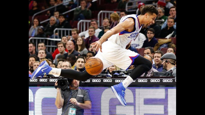 Philadelphia 76ers guard Michael Carter-Williams tries to save a loose ball during a home game against Milwaukee on Wednesday, January 7.