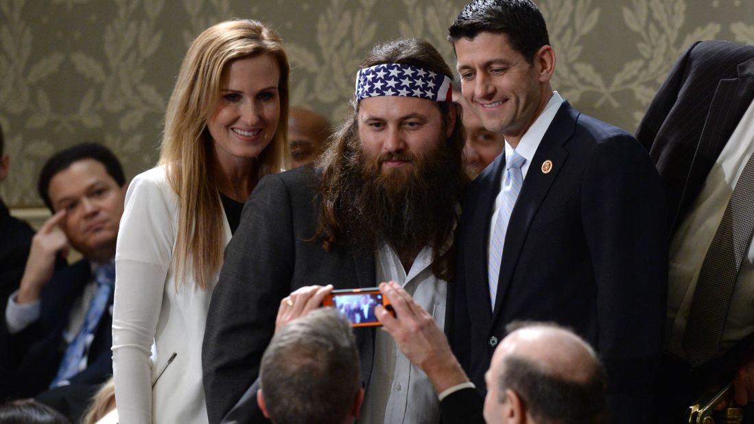 Willie Robertson of the reality TV series "Duck Dynasty" poses for a picture with Ryan and his wife, Janna, before President Obama delivers his State of the Union address on January 28, 2014.