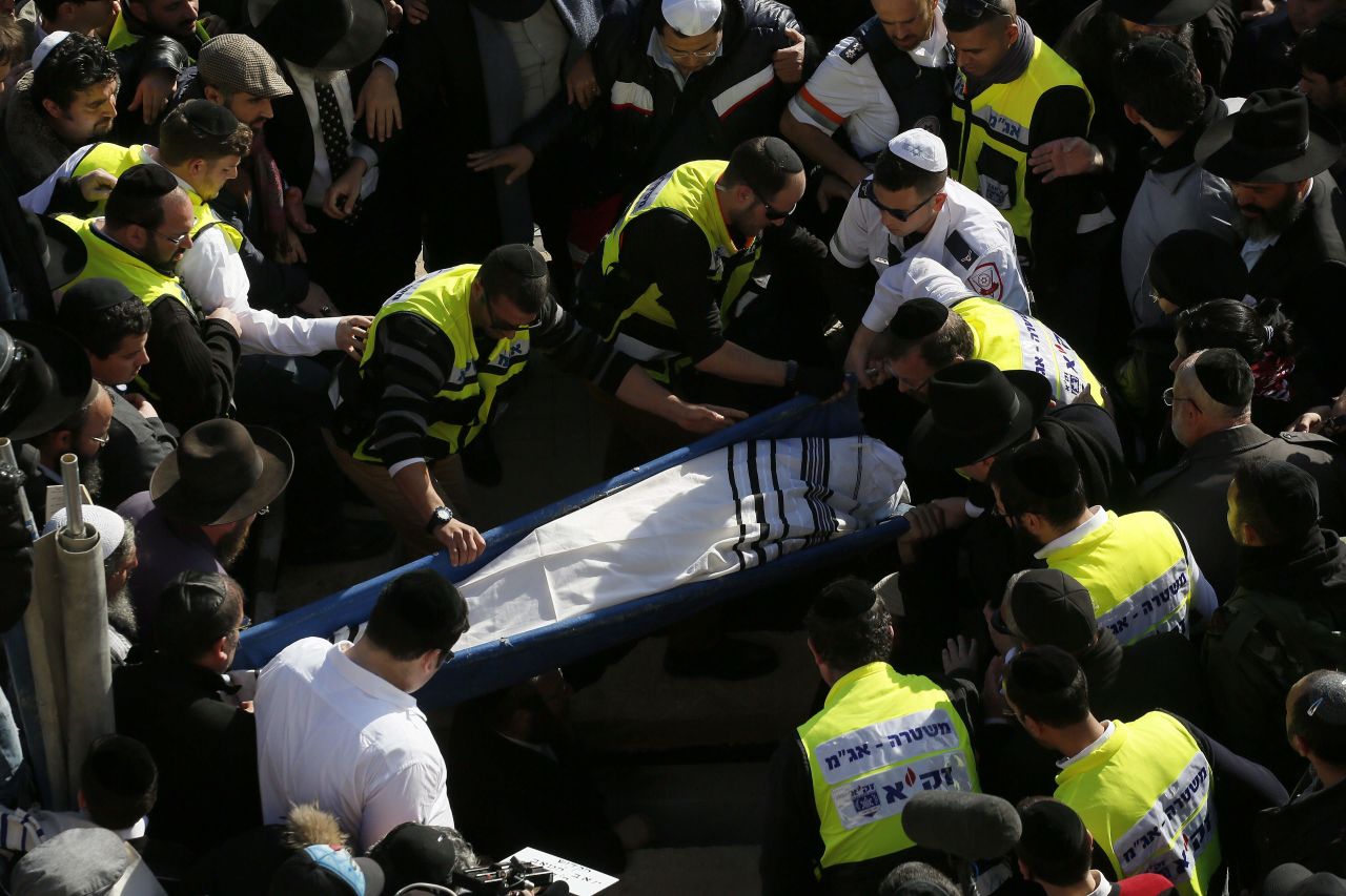 Mourners carry Hattab's body in Jerusalem on January 13.