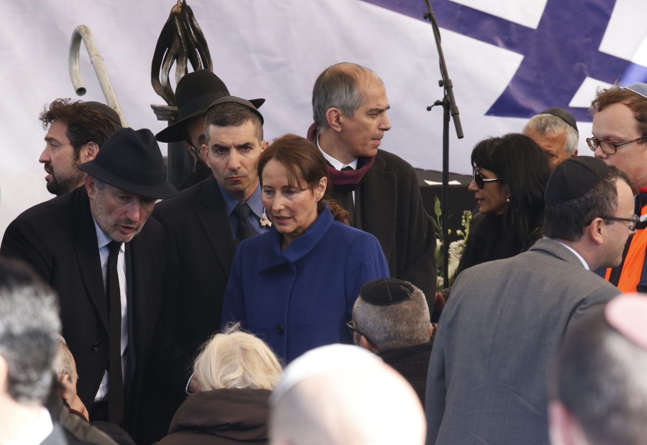 French Minister of Ecologie Segolene Royal (dressed in blue) joins mourners in Jerusalem.